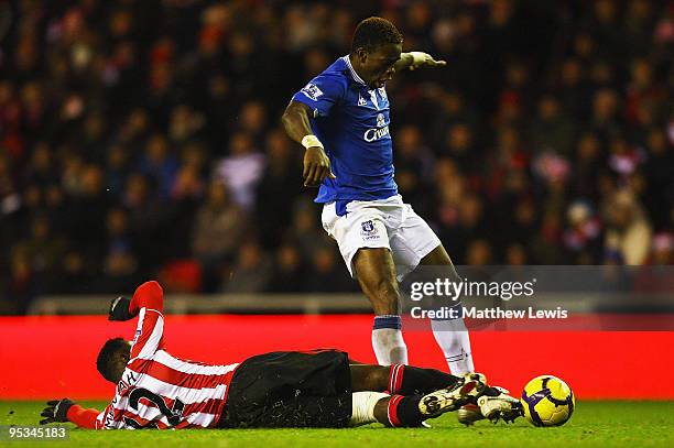 Louis Saha of Everton is tackled by Paulo Da Silva of Sunderland during the Barclays Premier League match between Sunderland and Everton at the...