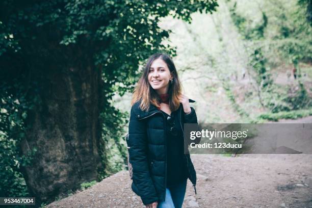 happy turkish woman walking at nature - 123ducu stock pictures, royalty-free photos & images