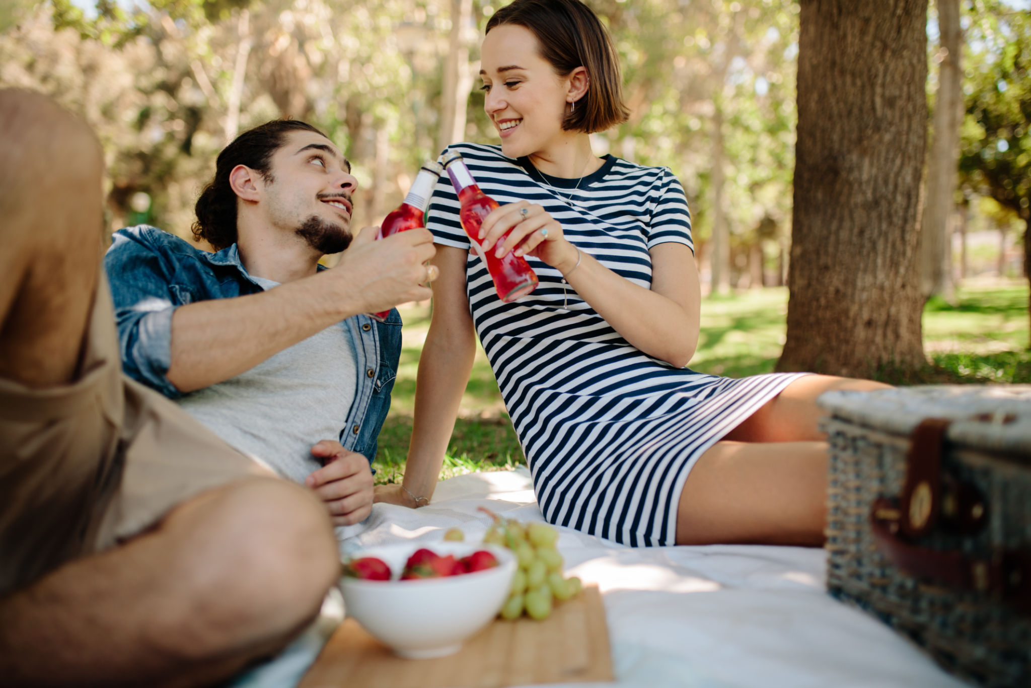 Couple having picnic at park Couple having picnic at park