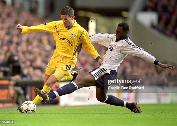 Eirik Bakke of Leeds United is challenged by Ledley King of Tottenham Hotspur during the FA Carling Premiership game at White Hart Lane in London,...