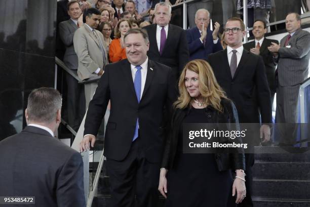 Mike Pompeo, U.S. Secretary of state, left, and his wife Susan Pompeo exit after speaking to employees at the State Department in Washington, D.C.,...