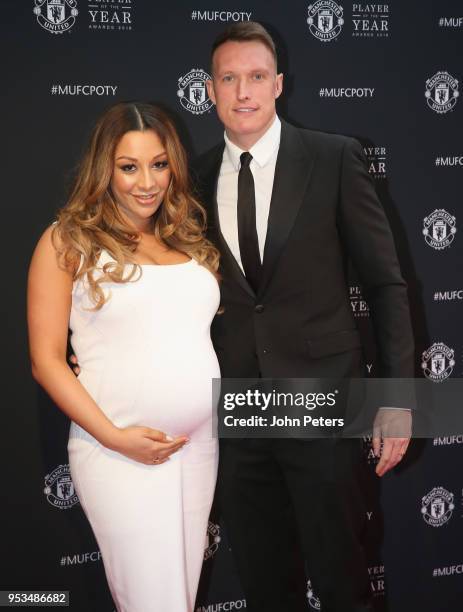 Phil Jones of Manchester United arrives with his partner at Old Trafford ahead of the club's annual Player of the Year awards at Old Trafford on May...