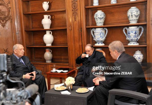 Handout photo shows Algeria's President Abdelaziz Bouteflika receiving Algerian Chief of Staff Ahmed Gaid Salah and Algeria's Prime Minister...