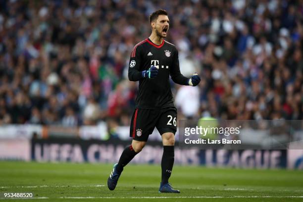 Sven Ulreich of Bayern Muenchen celebrates as Joshua Kimmich of Bayern Muenchen scores his sides first goal during the UEFA Champions League Semi...