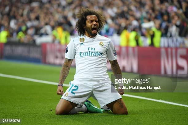 Marcelo of Real Madrid celebrates as Karim Benzema of Real Madrid scores his sides first goal during the UEFA Champions League Semi Final Second Leg...