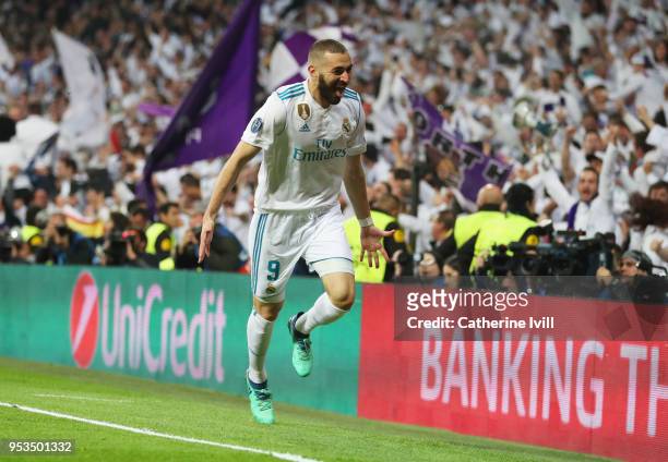 Karim Benzema of Real Madrid celebrates as he scores his sides second goal during the UEFA Champions League Semi Final Second Leg match between Real...