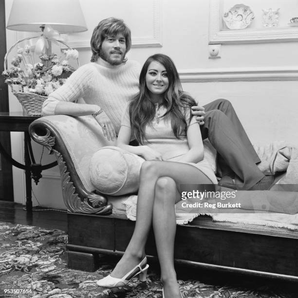 British singer, songwriter, musician and record producer Barry Gibb with his girlfriend Linda Gray, UK, 8th June 1970.