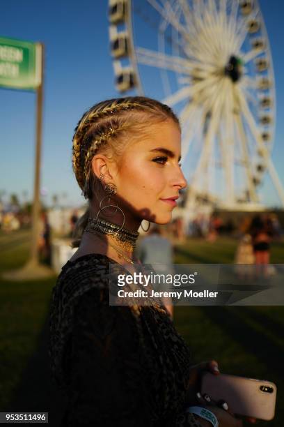 Caroline Daur wearing a complete Dior look during day 2 of the 2018 Coachella Valley Music & Arts Festival Weekend 1 on April 14, 2018 in Indio,...