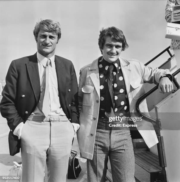 British soccer player Roger Hunt and Charlie Cooke about to board a flight to Mexico, UK, 1st June 1970.