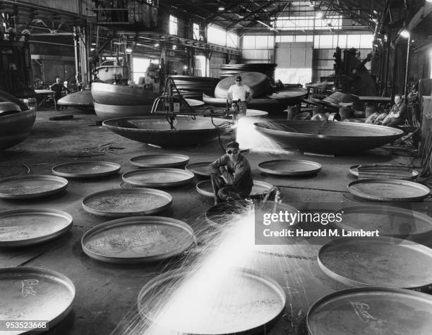 UNITED STATES, PENNSYLVANIA, COATESVILLE, MANUAL WORKERS WORKING IN LUKENS STEEL INDUSTRY