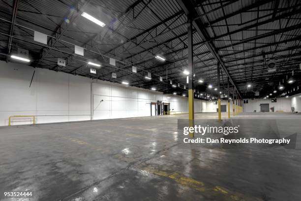 interior of empty warehouse hdr - roller shutter 個照片及圖片檔