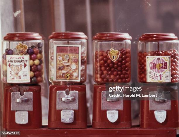 CLOSE-UP OF CANDY VENDING MACHINES