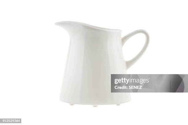 cream jug isolated on white - jug stockfoto's en -beelden