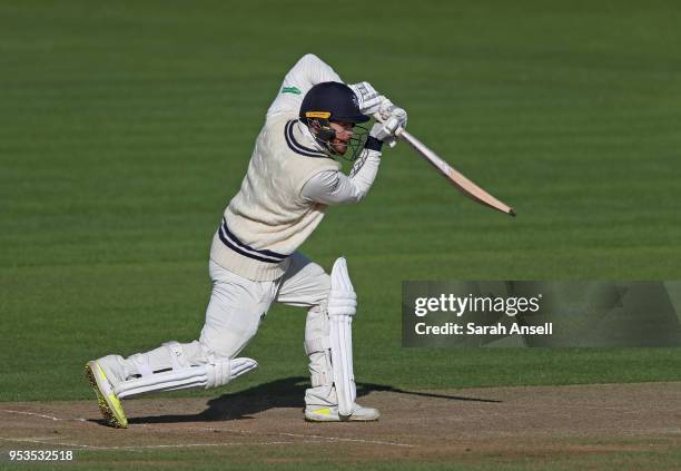 Adam Rouse of Kent hits a boundary on day 4 of the tour match between Kent and Pakistan on May 01, 2018 in Canterbury, England. .