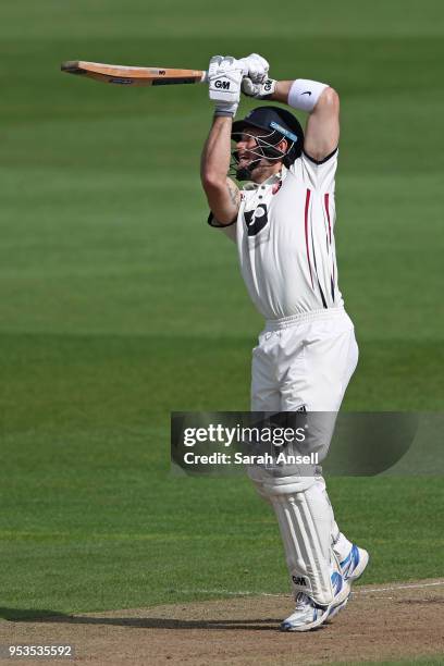 Sean Dickson of Kent hits a boundary on day 4 of the tour match between Kent and Pakistan on May 01, 2018 in Canterbury, England. .