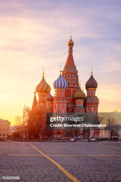 saint basil's cathedral during sunrise at red square in moscow,russia. - brick cathedral stock-fotos und bilder