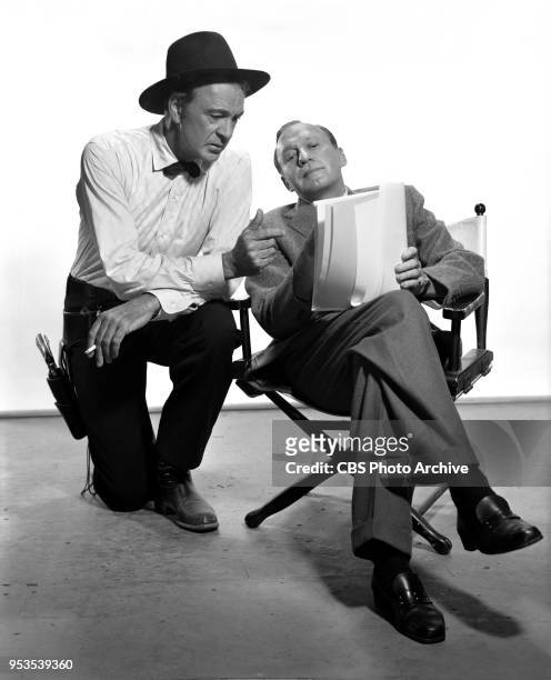 Jack Benny with show guest Gary Cooper . CBS television comedy program, The Jack Benny Show. Broadcast date September 21, 1958. Los Angeles, CA.