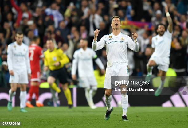 Cristiano Ronaldo of Real Madrid celebrates victory after the UEFA Champions League Semi Final Second Leg match between Real Madrid and Bayern...