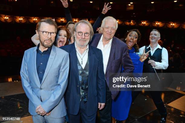Bjorn Ulvaeus, Cassidy Janson, Benny Andersson, Sir Tim Rice, Alexandra Burke and conductor John Rigby pose onstage during the press night...