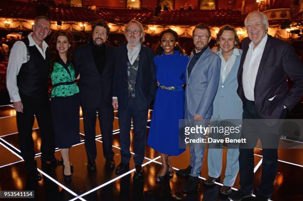 Conductor John Rigby, Cassidy Janson, Michael Ball, Benny Andersson, Alexandra Burke, Bjorn Ulvaeus, Tim Howar and Sir Tim Rice pose onstage during...