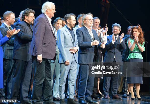Michael Ball, Sir Tim Rice, Bjorn Ulvaeus, Benny Andersson, conductor John Rigby, director Laurence Connor and Cassidy Janson bow at the curtain call...