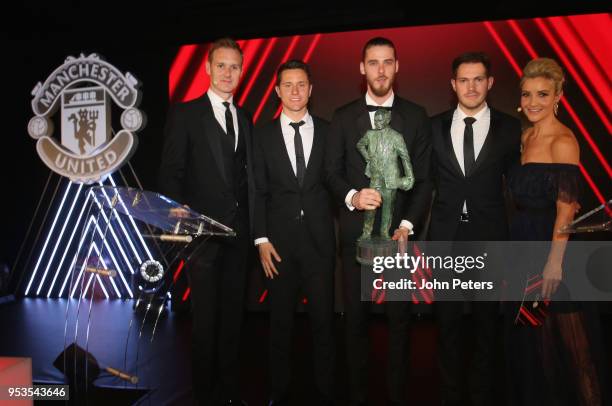 David de Gea of Manchester United is presented with the Fans' Player of the Season award by Ander Herrera at the club's annual Player of the Year...