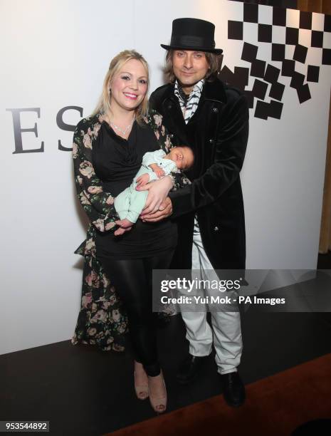 One of the stars of the musical Tim Howar and his wife Jodie, with their four day old baby son Hamish Rex, and who Tim had to leave the show during a...