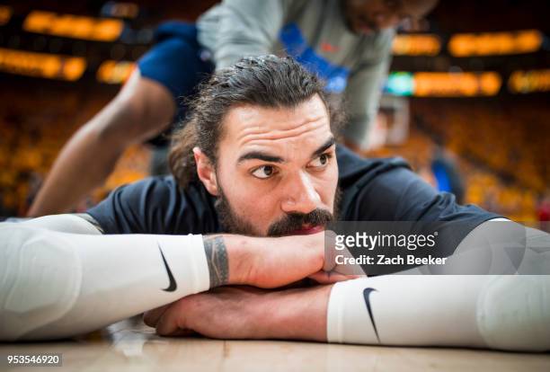 Steven Adams of the Oklahoma City Thunder stretches prior to Game Six of the Western Conference Quarterfinals during the 2018 NBA Playoffs against...