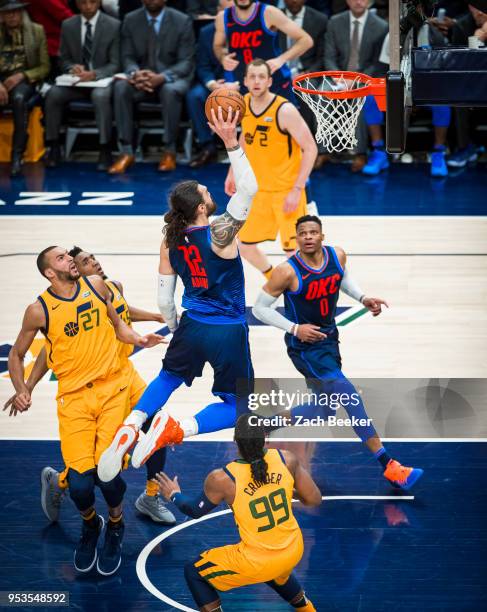 Steven Adams of the Oklahoma City Thunder dunks the ball against the Utah Jazz in Game Six of the Western Conference Quarterfinals during the 2018...