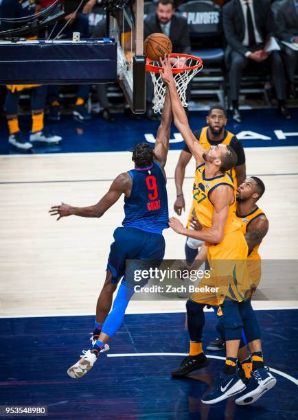 Jerami Grant of the Oklahoma City Thunder shoot the ball against Rudy Gobert of the Utah Jazz in Game Six of the Western Conference Quarterfinals...