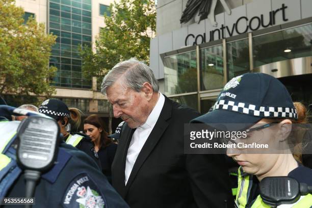 Cardinal George Pell leaves Melbourne Magistrates' Court on May 2, 2018 in Melbourne, Australia. Cardinal Pell was committed to stand trial on...