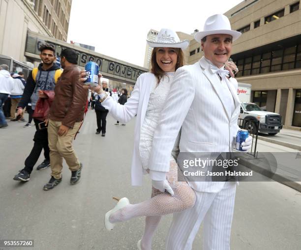 Viola Bauer and Rob Magnusson enjoy themselves at a street party before the Winnipeg Jets take on the Nashville Predators in Game Three of the...