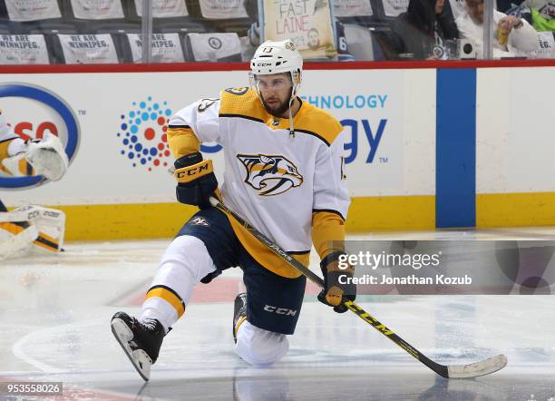 Nick Bonino of the Nashville Predators takes part in the pre-game warm up prior to NHL action against the Winnipeg Jets in Game Three of the Western...