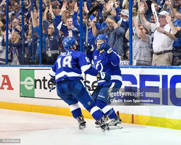 Tampa Bay Lightning center Tyler Johnson celebrates his goal with Tampa Bay Lightning left wing Ondrej Palat during the second period of an NHL...