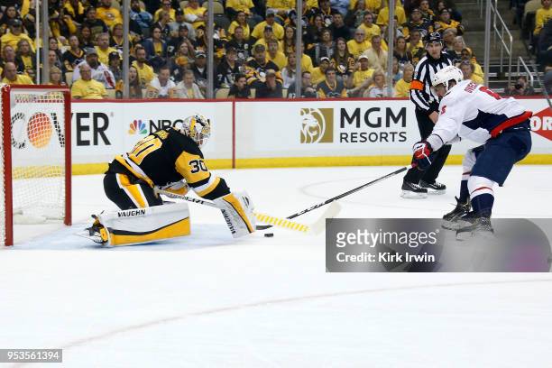 Matt Murray of the Pittsburgh Penguins stops a shot from Alex Ovechkin of the Washington Capitals during the first period in Game Three of the...