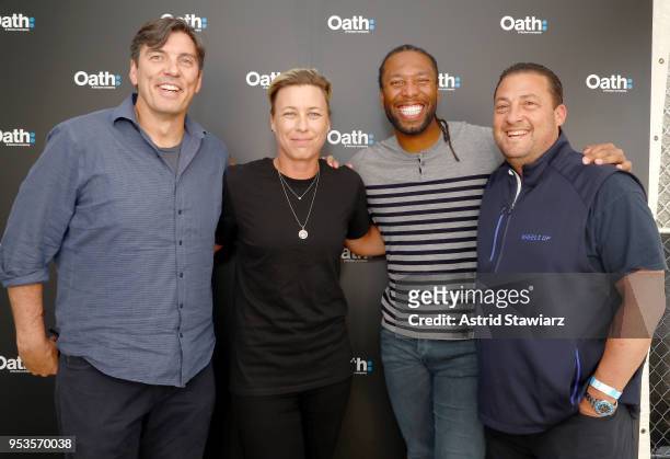 Of Oath Tim Armstrong, soccer player Abby Wambach, NFL player Larry Fitzgerald and Wheels Up CEO Kenny Dichter attend Oath NewFront at Pier 26 on May...