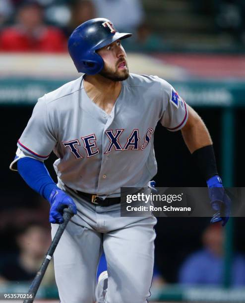 Joey Gallo of the Texas Rangers hits a solo home run off Nick Goody of the Cleveland Indians during the 12th inning at Progressive Field on May 1,...