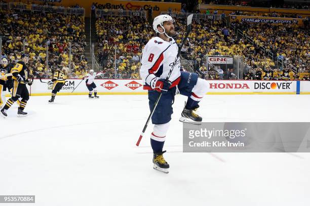 Alex Ovechkin of the Washington Capitals celebrates after scoring the game winning goal during the third period in Game Three of the Eastern...