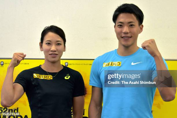 Ryota Yamagata and Chisato Fukushima pose for photographs during a press conference ahead of the 52nd Oda Memorial Meet at Edion Stadium Hiroshima on...