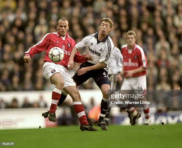 Claus Jensen of Charlton Athletic challenges Steffen Freund of Tottenham Hotspur during the FA Carling Premiership game at White Hart Lane in London,...