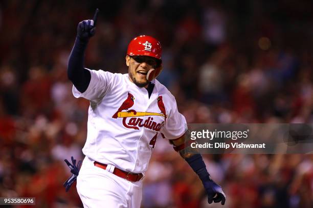 Yadier Molina of the St. Louis Cardinals celebrates after hitting a walk-off single against the Chicago White Sox in the ninth inning at Busch...