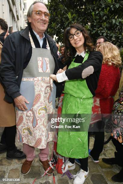 Singer Philippe Lavil and designer Zelia Van den Bulke attend Zelia Van Den Bulke Aprons Show At Zelia Abbesses Shop on May 1, 2018 in Paris, France.