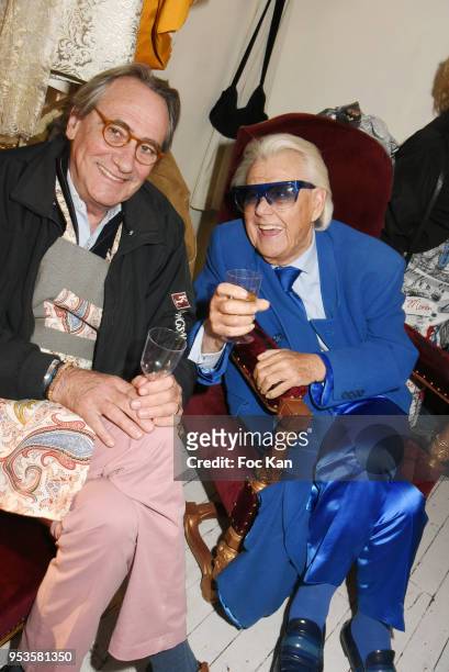 Singer Philippe Lavil and Michou from Cabaret Chez Michou attend Zelia Van Den Bulke Show At Zelia Abbesses Shop on May 1, 2018 in Paris, France.