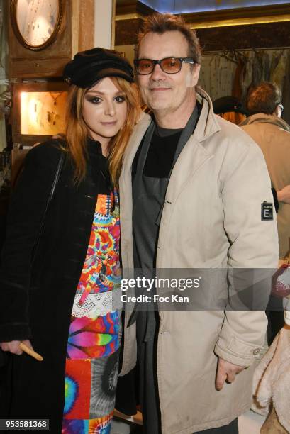 Painter Erica and Singer Axel Bauer attend Zelia Van Den Bulke Aprons show At Zelia Abbesses Shop on May 1, 2018 in Paris, France.
