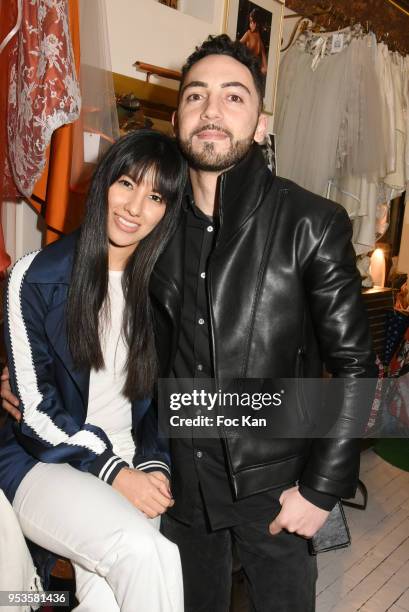 Emilia Velasquez Krief and David Sparte attend Zelia Van Den Bulke Aprons show At Zelia Abbesses Shop on May 1, 2018 in Paris, France.