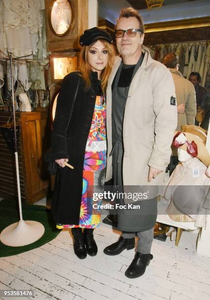 Painter Erica and Singer Axel Bauer attend Zelia Van Den Bulke Aprons show At Zelia Abbesses Shop on May 1, 2018 in Paris, France.