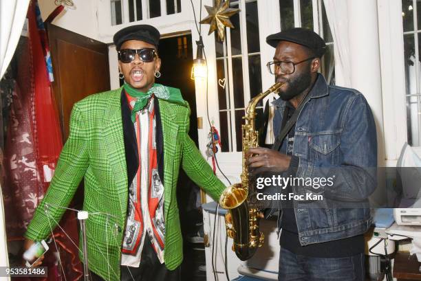 Singer Robby the Lord and saxo Mezz attend Zelia Van Den Bulke Aprons show At Zelia Abbesses Shop on May 1, 2018 in Paris, France.