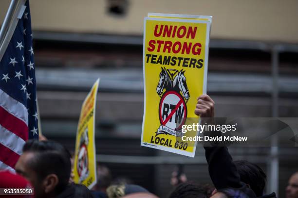 Teamsters march on May Day, on May 1, 2018 in Los Angeles, California. Numerous May Day, or International Workers Day, marches are taking place in...