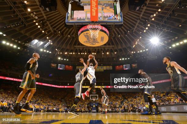 Darius Miller of the New Orleans Pelicans shoots the ball against the Golden State Warriors in Game Two of the Western Conference Semifinals during...