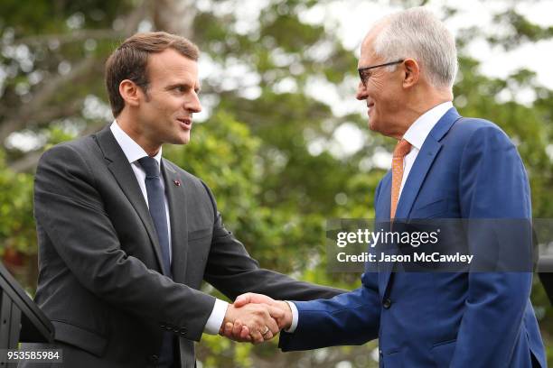 French president Emmanuel Macron and Australian Prime Minister Malcolm Turnbull shake hands on May 2, 2018 in Sydney, Australia. President Macron is...